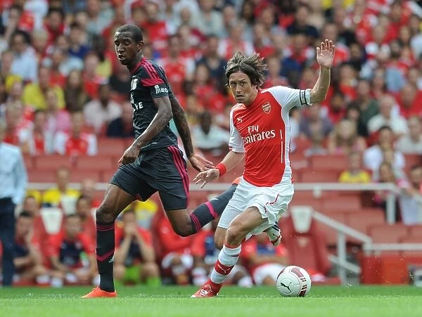 Tomas Rosicky (Arsenal) Anderson Talisca (Benfica). Arsenal 5: 1 Benfica. The Emirates Cup, Day 1