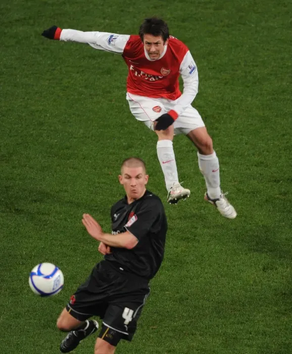 Framed Print : Tomas Rosicky (Arsenal) Ben Chorley (Orient). Arsenal 5: 0 Leyton Orient
