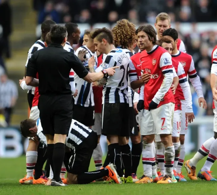 Framed Print : Tomas Rosicky (Arsenal) chats to referee Lee Probert. Newcastle United 0: 1 Arsenal