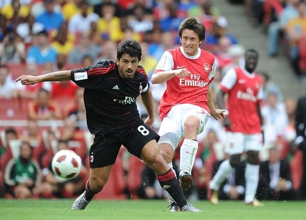 Tomas Rosicky (Arsenal) Gennaro Gattuso (Milan). Arsenal 1: 1 AC Milan. Emirates Cup