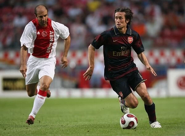 Tomas Rosicky (Arsenal) Kennedy Bakircioglu (Ajax)