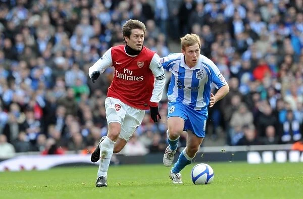 Tomas Rosicky (Arsenal) Scott Arfield (Huddersfield). Arsenal 2:1 Huddersfield Town