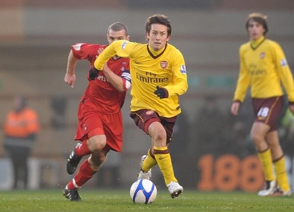 Tomas Rosicky (Arsenal) Stephen Dawson (Orient). Leyton Orient 1: 1 Arsenal