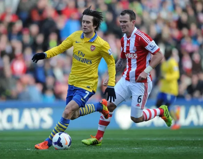 Framed Print : Tomas Rosicky Outmaneuvers Glenn Whelan: A Moment from the Stoke City vs. Arsenal Premier League Clash (2013-14) Framed Print : Tomas Rosicky Outmaneuvers Glenn Whelan: A Moment from the Stoke City vs. Arsenal Premier League Clash (2013-14)