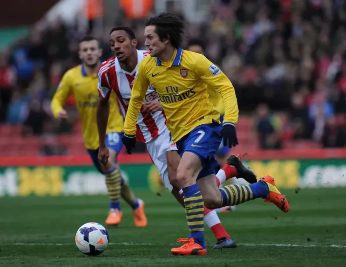 Framed Print : Tomas Rosicky Outmaneuvers Steven Nzonzi: A Moment from the Stoke City vs. Arsenal Premier League Clash (2013-14) Framed Print : Tomas Rosicky Outmaneuvers Steven Nzonzi: A Moment from the Stoke City vs. Arsenal Premier League Clash (2013-14)