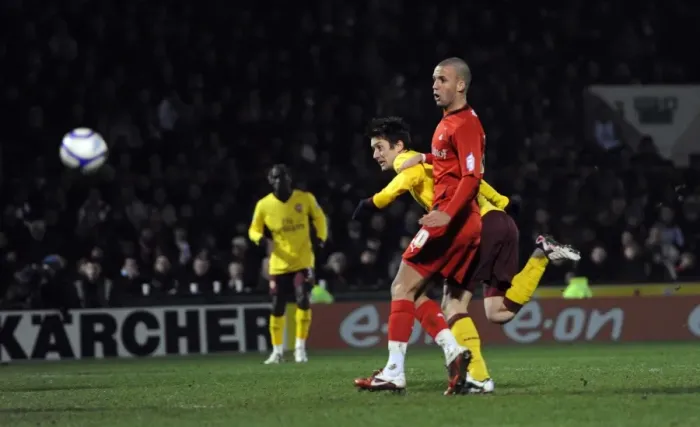 Framed Print : Tomas Rosicky scores Arsenals goal under pressure from Jimmy Smith (Orient) Framed Print : Tomas Rosicky scores Arsenals goal under pressure from Jimmy Smith (Orient)