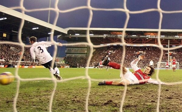 Tomas Rosicky slides in to score the 3rd Arsenal goal