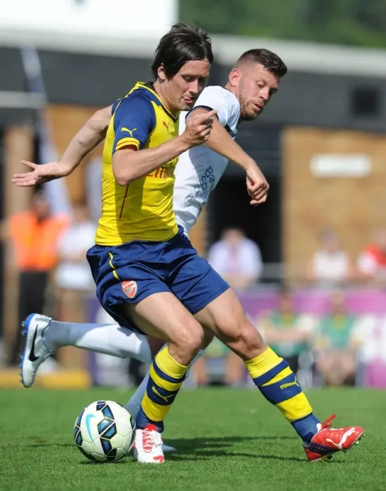 Framed Print : Tomas Rosicky vs. Luke Garrard: A Battle in Arsenal's Pre-Season Friendly Against Boreham Wood