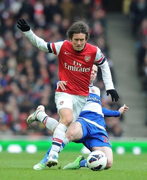 Tomas Rosicky's Slick Moves: Outmaneuvering Danny Guthrie in the 2012-13 Arsenal-Reading Match