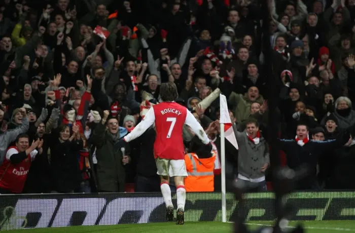 Framed Print : Tomas Rosicky's Thrilling Goal: Arsenal Fans Go Wild as Gunners Lead 2:0 Over Wigan Athletic Framed Print : Tomas Rosicky's Thrilling Goal: Arsenal Fans Go Wild as Gunners Lead 2:0 Over Wigan Athletic