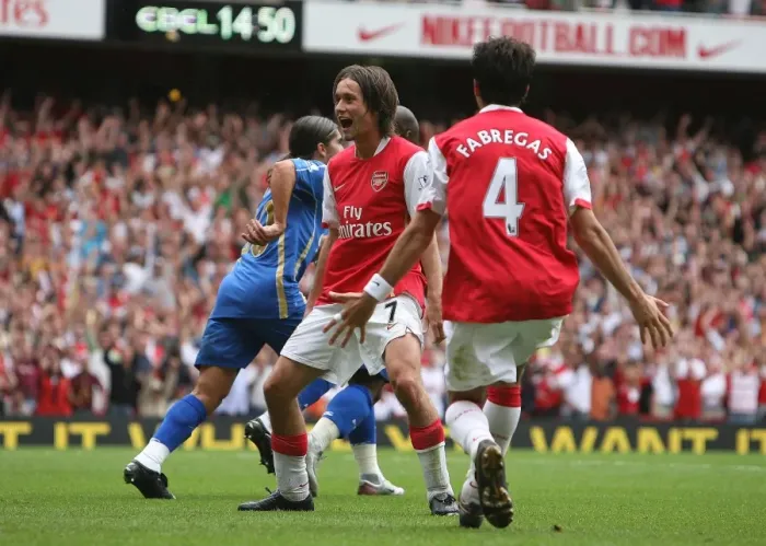 Framed Print : Tomas Rosicky's Triumph: Arsenal's Thrilling 3-1 Victory Over Portsmouth in the Premier League (2007) Framed Print : Tomas Rosicky's Triumph: Arsenal's Thrilling 3-1 Victory Over Portsmouth in the Premier League (2007)