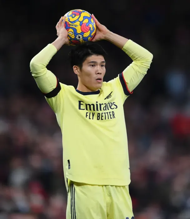 Framed Print : Tomiyasu Stands Firm: Arsenal's Defensive Hero at Old Trafford vs Manchester United (Premier League 2020-21)