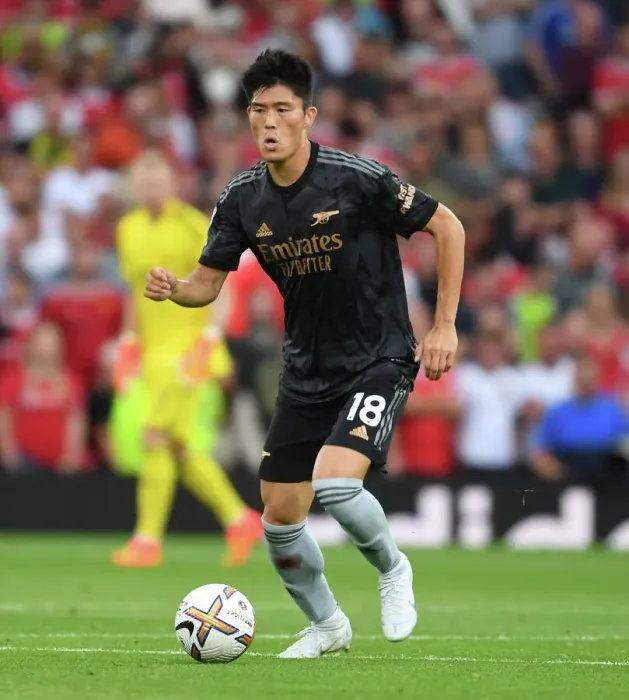 Framed Print : Tomiyasu Stands Firm: Arsenal's Defensive Hero at Old Trafford vs. Manchester United (2022-23 Premier League) Framed Print : Tomiyasu Stands Firm: Arsenal's Defensive Hero at Old Trafford vs. Manchester United (2022-23 Premier League)