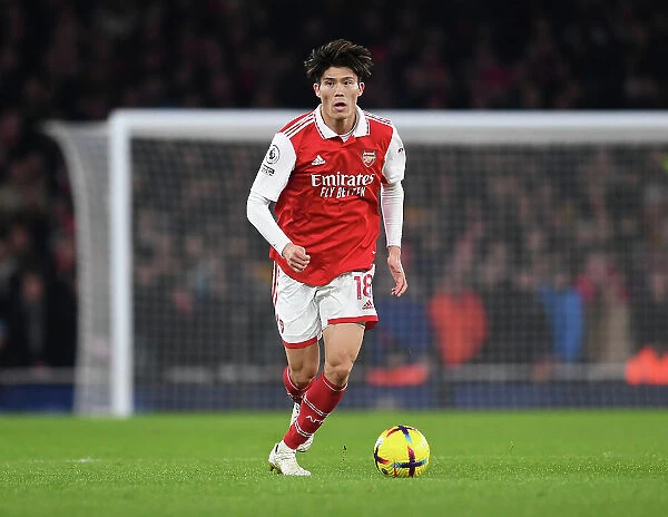 Tomiyasu Stands Firm Against Manchester United in Arsenal's Premier League Battle (2022-23)
