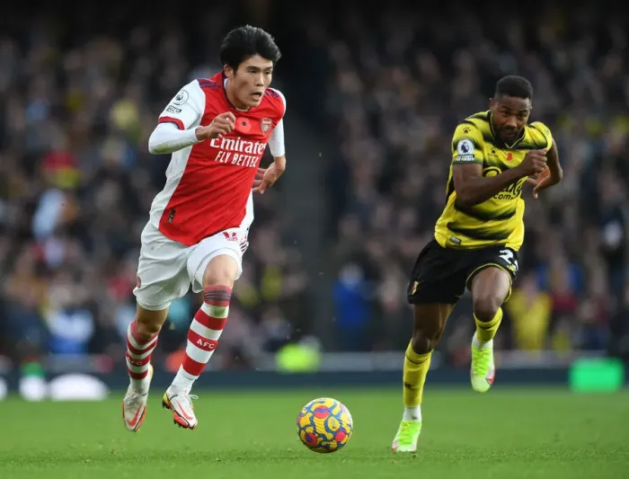 Framed Print : Tomiyasu vs. Dennis: A Clash at Emirates Stadium - Arsenal vs. Watford (2021-22)