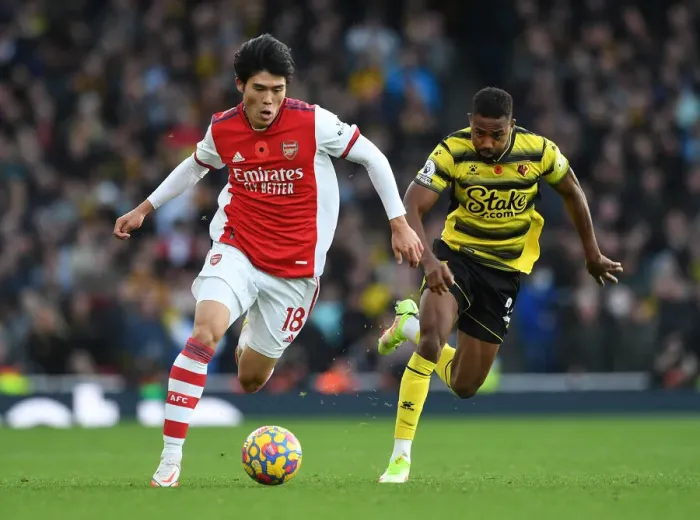 Framed Print : Tomiyasu vs. Dennis: A Premier League Showdown at Emirates Stadium