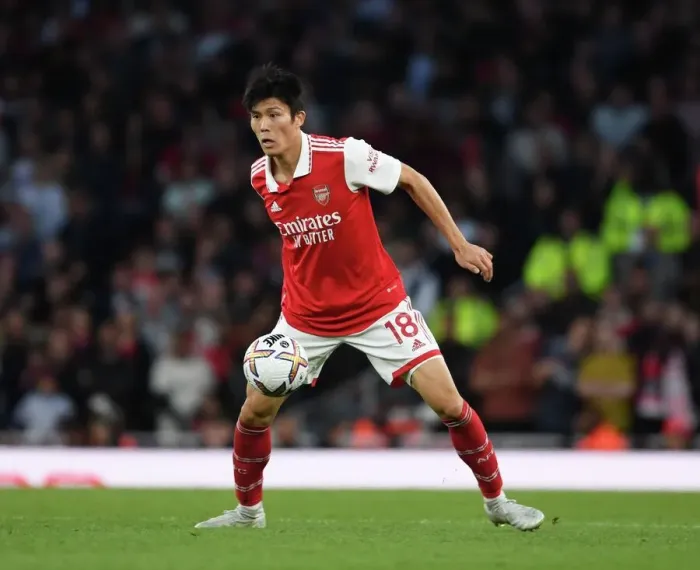 Framed Print : Tomiyasu vs. Liverpool: Arsenal's Defender in Premier League Showdown Framed Print : Tomiyasu vs. Liverpool: Arsenal's Defender in Premier League Showdown