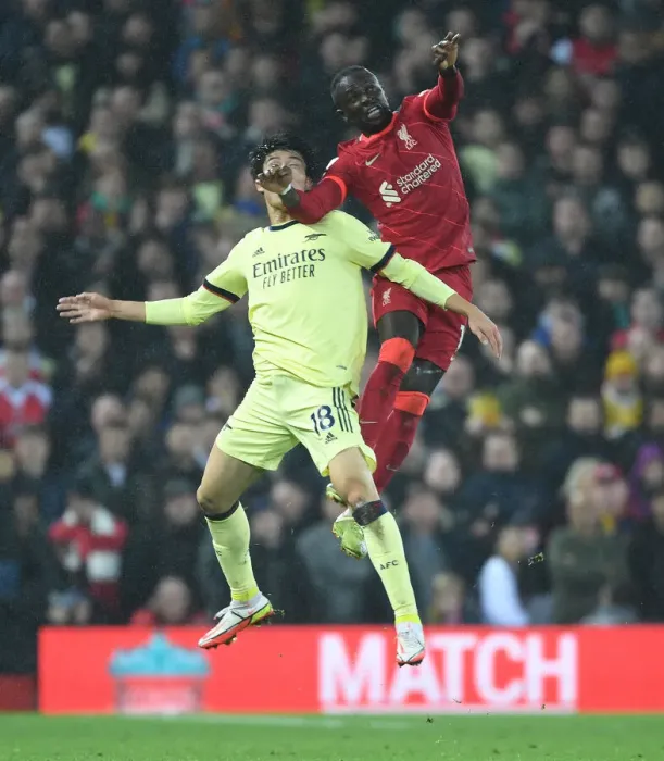 Framed Print : Tomiyasu vs. Mane: A Foul Rivalry - Liverpool vs. Arsenal at Anfield Framed Print : Tomiyasu vs. Mane: A Foul Rivalry - Liverpool vs. Arsenal at Anfield