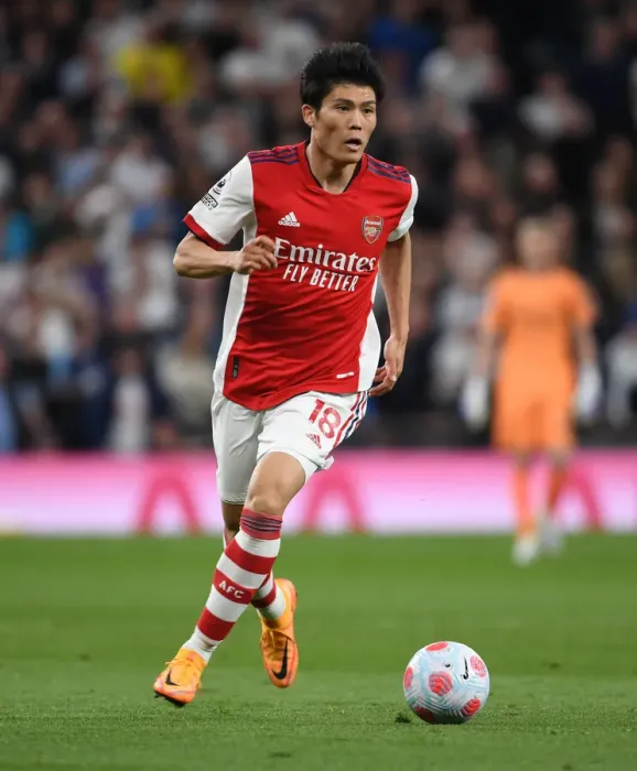 Framed Print : Tomiyasu vs. Tottenham: Intense Rivalry Clash - Arsenal's Star Defender Faces Off in Premier League Showdown