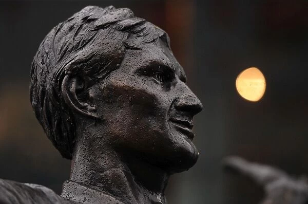 Tony Adams Statue at Emirates Stadium: Arsenal's Legendary Captain Amidst Premier League Action