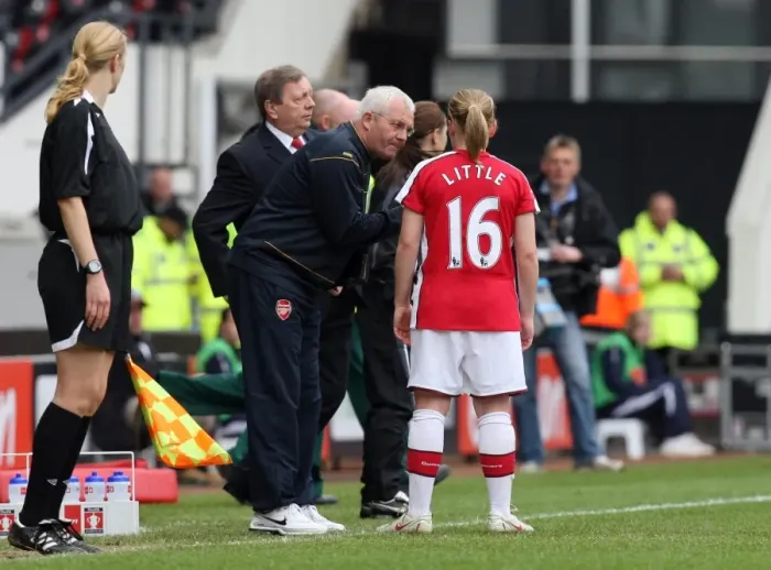 Framed Print : Tony Gervaise the Arsenal Assistant Manager talks to Kim Little