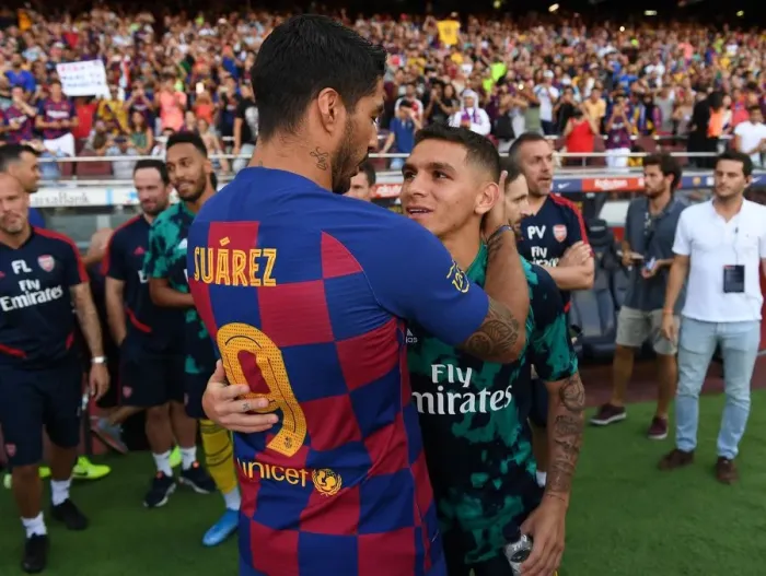 Framed Print : Torreira and Suarez Face Off: FC Barcelona vs. Arsenal Pre-Season Clash, 2019