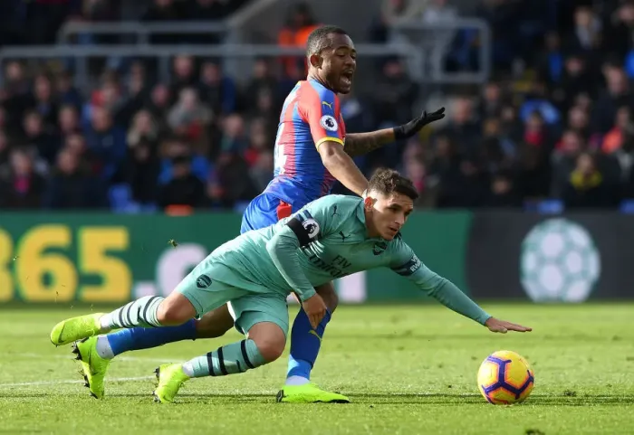 Framed Print : Torreira vs Ayew: Intense Battle in Crystal Palace vs Arsenal FC Premier League Clash