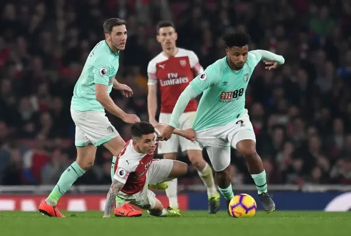 Framed Print : Torreira vs. Mousset: Intense Battle in Arsenal's Victory over Bournemouth Framed Print : Torreira vs. Mousset: Intense Battle in Arsenal's Victory over Bournemouth