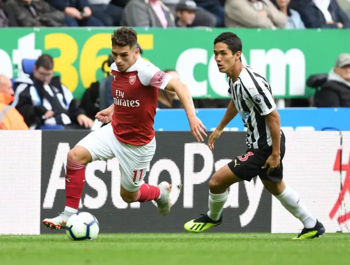 Framed Print : Torreira vs Muto: A Premier League Showdown at St. James Park Framed Print : Torreira vs Muto: A Premier League Showdown at St. James Park
