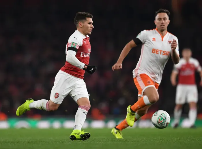 Framed Print : Torreira vs. O'Sullivan: Arsenal's Midfield Showdown in Carabao Cup Battle Against Blackpool