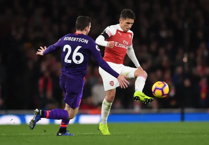 Framed Print : Torreira vs Robertson: Intense Battle in Arsenal vs Liverpool Premier League Clash Framed Print : Torreira vs Robertson: Intense Battle in Arsenal vs Liverpool Premier League Clash