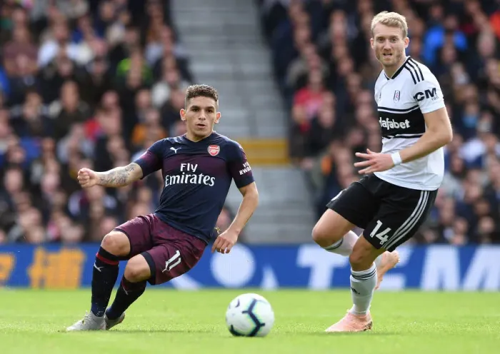 Framed Print : Torreira vs. Schurrle: Intense Battle in Fulham v Arsenal Premier League Clash Framed Print : Torreira vs. Schurrle: Intense Battle in Fulham v Arsenal Premier League Clash