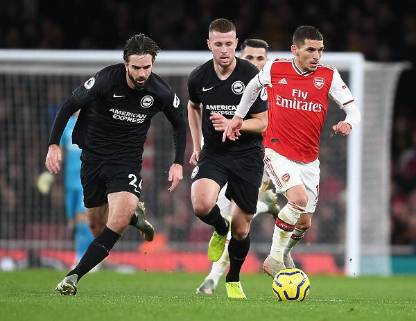 Torreira's Agile Run: Outshining Brighton Defenders at Emirates Stadium