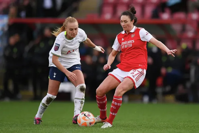 Framed Print : Tottenham vs Arsenal: Women's Super League Clash - Jodie Taylor Fights Past Opponent