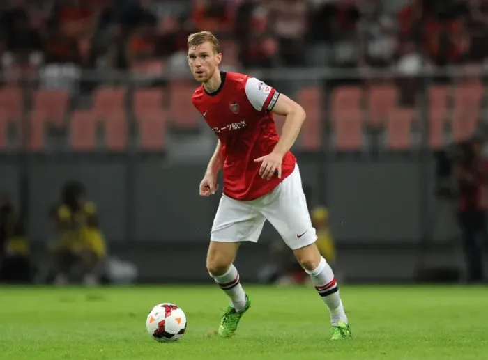 Framed Print : TOYOTA, JAPAN - JULY 22: Per Mertesacker of Arsenal FC during the pre-season Asian Tour friendly match between Nagoya Framed Print : TOYOTA, JAPAN - JULY 22: Per Mertesacker of Arsenal FC during the pre-season Asian Tour friendly match between Nagoya