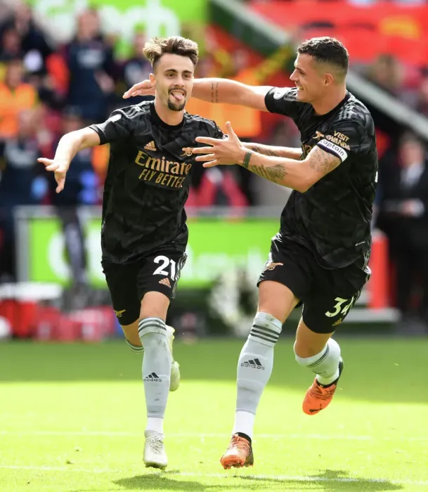 Framed Print : Triumphant Moment: Fabio Vieira and Granit Xhaka Celebrate Arsenal's Goals Against Brentford (2022-23)