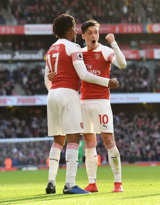 Framed Print : Triumphant Moment: Iwobi and Ozil's Euphoric Goal Celebration (Arsenal vs Burnley, 2018-19)