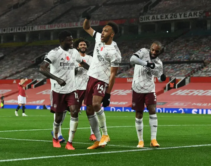 Framed Print : Triumphant Threesome: Aubameyang, Partey, and Lacazette's Goal Celebration at Empty Old Trafford (Manchester United vs Arsenal, 2020-21) Framed Print : Triumphant Threesome: Aubameyang, Partey, and Lacazette's Goal Celebration at Empty Old Trafford (Manchester United vs Arsenal, 2020-21)
