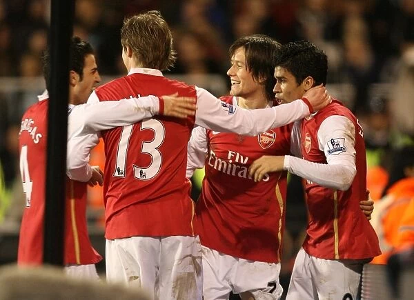 Triumphant Threesome: Rosicky, Eduardo, and Fabregas Celebrate Arsenal's 3rd Goal vs. Fulham (2008)