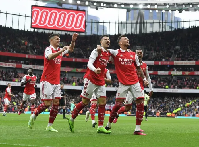 Framed Print : Triumphant Threesome: White, Xhaka, Martinelli Celebrate Arsenal's Goal Against Leeds United