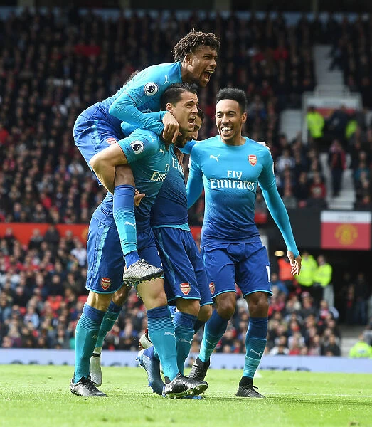 Triumphant Trio: Mkhitaryan, Xhaka, Iwobi's Unforgettable Goal Celebration (Arsenal vs Manchester United, 2017-18)