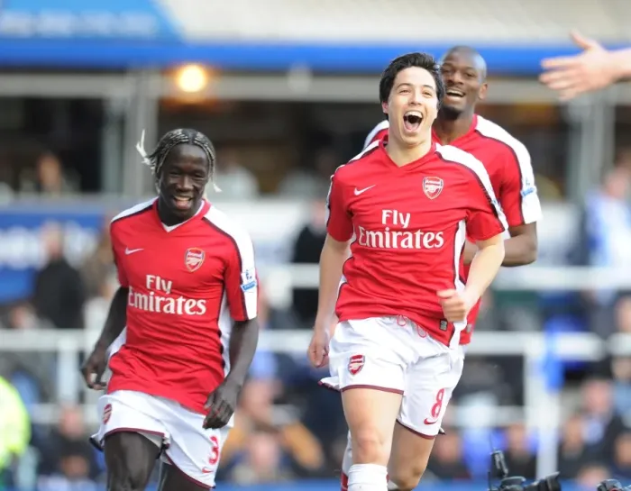 Framed Print : Triumphant Trio: Nasri, Sagna, Diaby's Unforgettable Goal Celebration vs. Birmingham City (2010)