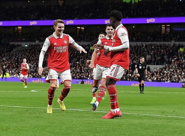 Triumphant Trio: Saka, Odegaard, Xhaka - Arsenal's First Goals of 2023 in Derby Win over Tottenham