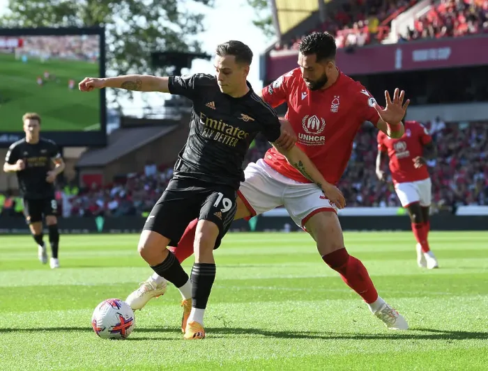 Framed Print : Trossard vs. Felipe: Intense Clash Between Nottingham Forest and Arsenal FC in Premier League Framed Print : Trossard vs. Felipe: Intense Clash Between Nottingham Forest and Arsenal FC in Premier League
