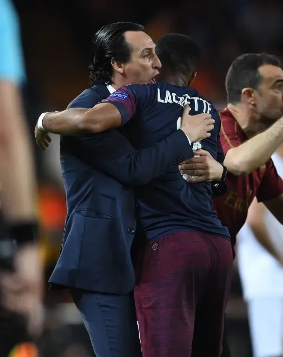 Framed Print : Unai Emery and Alex Lacazette's Emotional Moment: Arsenal's Europa League Semi-Final Victory over Valencia
