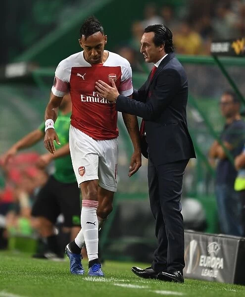 Unai Emery Consults with Aubameyang during Arsenal's Europa League Clash with Sporting Lisbon