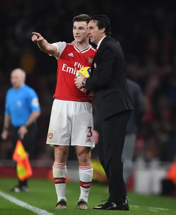 Framed Print : Unai Emery and Kieran Tierney: Strategic Talks on the Arsenal Touchline during Southampton Match