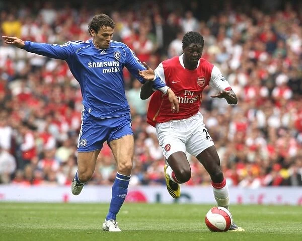The Unforgettable Clash: Adebayor vs. Boulahrouz - Intense 1:1 Battle, Arsenal vs. Chelsea, FA Premiership, May 6, 2007