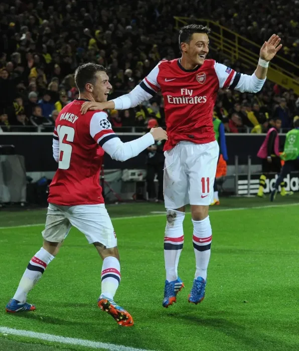 Framed Print : Unforgettable Goal Celebration: Ramsey and Ozil's Strike for Arsenal at Borussia Dortmund, UEFA Champions League (2013-14) Framed Print : Unforgettable Goal Celebration: Ramsey and Ozil's Strike for Arsenal at Borussia Dortmund, UEFA Champions League (2013-14)