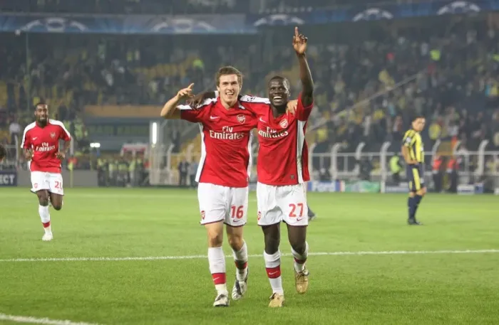 Framed Print : Unforgettable Night: Ramsey's Brace Leads Arsenal to a 5-2 Victory over Fenerbahce in the Champions League